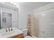 Clean bathroom with shower/tub combo and updated vanity at 9108 Bassett Ln # B, New Port Richey, FL 34655