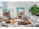 Relaxing living room with hardwood floors and comfortable seating at 1096 Florian Way, Spring Hill, FL 34609