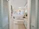 Spa-like bathroom with a large corner bathtub, double vanity, and updated fixtures at 1096 Florian Way, Spring Hill, FL 34609
