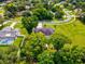 Aerial view showcasing house, large backyard, and neighborhood at 1096 Florian Way, Spring Hill, FL 34609