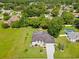 Aerial view of a single-Gathering home with a pool and large backyard at 1096 Florian Way, Spring Hill, FL 34609
