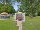 Relaxing hot tub with gazebo cover in a spacious backyard at 1096 Florian Way, Spring Hill, FL 34609