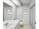 Simple bathroom with a single vanity, toilet, and shower at 1096 Florian Way, Spring Hill, FL 34609