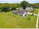 Aerial view of house with large backyard and surrounding area at 1096 Florian Way, Spring Hill, FL 34609
