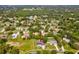 Aerial view of single-Gathering home in a residential neighborhood at 1096 Florian Way, Spring Hill, FL 34609