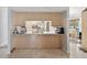 Kitchen with a pass-through to the dining and living areas at 1096 Florian Way, Spring Hill, FL 34609