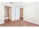 Bedroom with carpet flooring and access to bathroom at 5614 Red Snapper Ct, New Port Richey, FL 34652