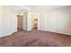 Bright bedroom with access to bathroom and hallway at 5614 Red Snapper Ct, New Port Richey, FL 34652