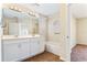 Bathroom boasts double vanity and a shower/tub combo at 5614 Red Snapper Ct, New Port Richey, FL 34652