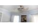 Crystal and silver ceiling fan with light kit in a dining room at 4516 Seagull Dr # 414, New Port Richey, FL 34652