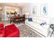 Bright living room featuring hardwood floors, comfortable seating and large windows at 4516 Seagull Dr # 414, New Port Richey, FL 34652