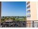 Scenic water view from balcony, overlooking homes and parking at 4516 Seagull Dr # 414, New Port Richey, FL 34652
