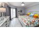 King size bed, dresser and water view at 4516 Seagull Dr # 414, New Port Richey, FL 34652