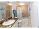 Clean bathroom with granite vanity and tub shower combo at 4516 Seagull Dr # 414, New Port Richey, FL 34652