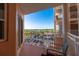 Relaxing balcony overlooking a parking area and water views at 4516 Seagull Dr # 414, New Port Richey, FL 34652