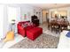 Open living and dining area with hardwood floors and comfortable seating at 4516 Seagull Dr # 414, New Port Richey, FL 34652