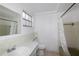 Bathroom with a shower/tub combination, a toilet, and a sink at 12307 Fieldstone Ln, Hudson, FL 34667