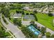 Aerial view of community tennis and pickleball courts at 11724 Heritage Point Dr, Hudson, FL 34667