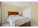 Comfortable bedroom with double bed and built-in closet at 11724 Heritage Point Dr, Hudson, FL 34667
