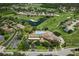 Aerial view of community clubhouse and golf course at 11724 Heritage Point Dr, Hudson, FL 34667