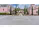 Pink building with courtyard and parking at 5939 Grand Blvd, New Port Richey, FL 34652