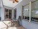 Relaxing patio with seating and view of the backyard at 18937 Grand Club Dr, Hudson, FL 34667