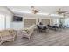 Community room with seating and game tables at 2522 Pine Ridge S Way # A2, Palm Harbor, FL 34684
