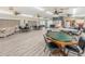 Community room with seating, tables, and game tables at 2522 Pine Ridge S Way # A2, Palm Harbor, FL 34684