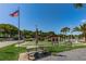 Community shuffleboard with picnic tables nearby at 2522 Pine Ridge S Way # A2, Palm Harbor, FL 34684