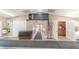 Hallway leading to community room amenities at 2522 Pine Ridge S Way # A2, Palm Harbor, FL 34684