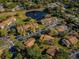 Aerial view showing community layout and ample parking at 2522 Pine Ridge S Way # A2, Palm Harbor, FL 34684