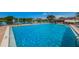 Sparkling community pool perfect for relaxation at 2522 Pine Ridge S Way # A2, Palm Harbor, FL 34684