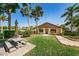 Community clubhouse with adjacent picnic tables at 2522 Pine Ridge S Way # A2, Palm Harbor, FL 34684