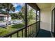 View from the screened balcony of the community and parking area at 2522 Pine Ridge S Way # A2, Palm Harbor, FL 34684