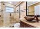 Updated bathroom with glass shower, vessel sink, and modern vanity at 6316 Spoonbill Dr, New Port Richey, FL 34652