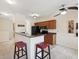 Modern kitchen with granite countertops and island at 5624 Red Snapper Ct, New Port Richey, FL 34652