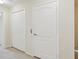 Hallway with double doors and an elevator at 5624 Red Snapper Ct, New Port Richey, FL 34652