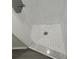 Clean shower with white hexagon tile flooring at 7832 Fox Den Row, Hudson, FL 34667