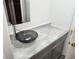 Modern bathroom with vessel sink and gray countertop at 7832 Fox Den Row, Hudson, FL 34667