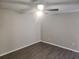 Bright bedroom with ceiling fan and grey walls at 7832 Fox Den Row, Hudson, FL 34667