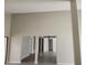 Spacious living area with high ceilings and neutral tones at 7832 Fox Den Row, Hudson, FL 34667