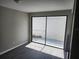 Dining area with sliding glass doors to patio at 7832 Fox Den Row, Hudson, FL 34667
