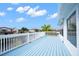Spacious deck overlooking the water with white railings at 13521 Stacey Dr, Hudson, FL 34667