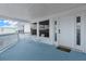 Private balcony features a small table and chairs at 13521 Stacey Dr, Hudson, FL 34667