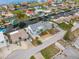 Aerial view of a waterfront community with canals and houses at 13521 Stacey Dr, Hudson, FL 34667