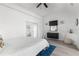 Main bedroom with king bed, dresser, and blue rug at 13521 Stacey Dr, Hudson, FL 34667