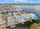 Aerial showing waterfront homes, canals, and boat access at 13521 Stacey Dr, Hudson, FL 34667