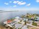 Aerial view of waterfront homes with private docks and boat slips at 13521 Stacey Dr, Hudson, FL 34667