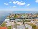 Aerial view of a waterfront community with houses and boats at 13521 Stacey Dr, Hudson, FL 34667