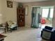 Living Room with tile floors and access to a sunroom at 5123 Topaz Ln # 105, New Port Richey, FL 34652